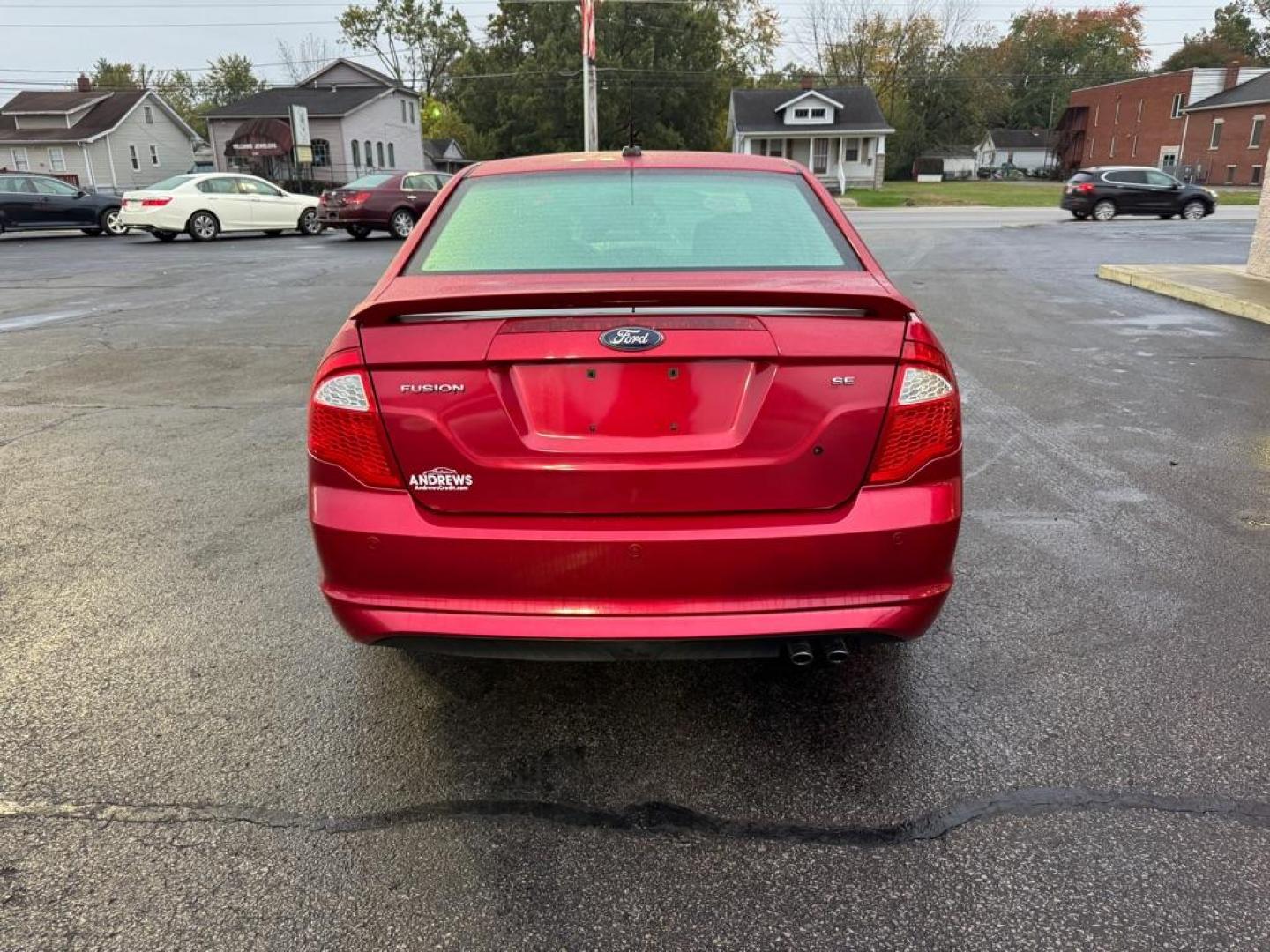 2012 RED FORD FUSION SE (3FAHP0HAXCR) with an 2.5L engine, Automatic transmission, located at 3100 Covert Avenue, Evansville, IN, 47714, (812) 473-4492, 37.955418, -87.512238 - Photo#3