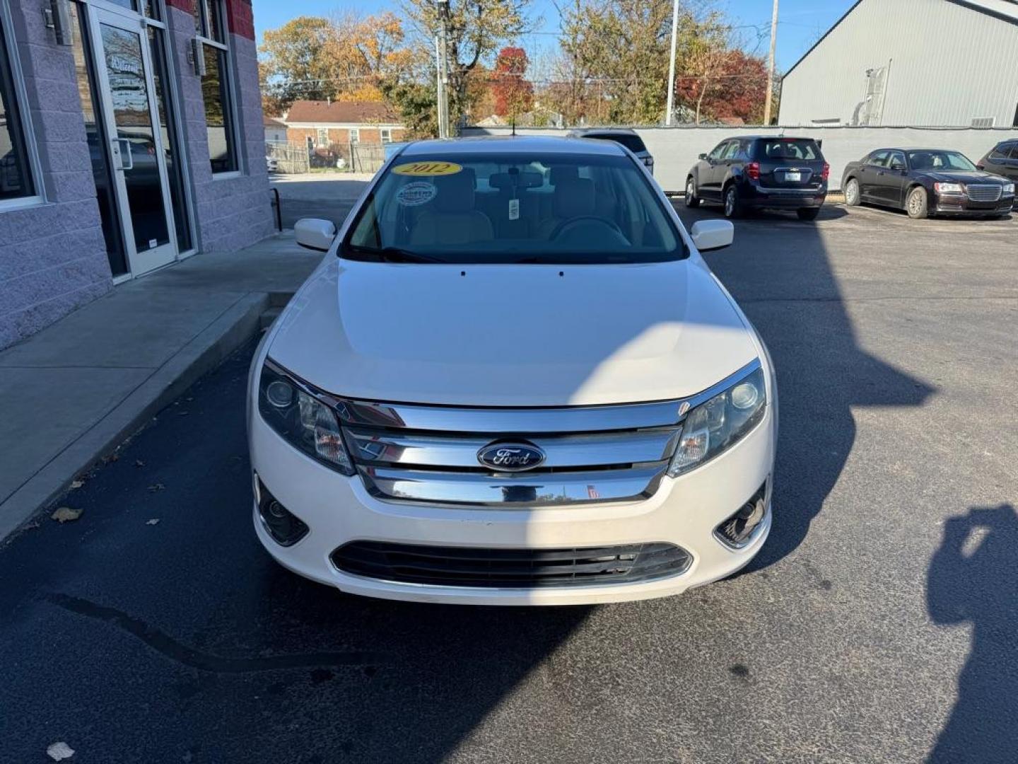 2012 WHITE FORD FUSION SEL (3FAHP0JA1CR) with an 2.5L engine, Automatic transmission, located at 3100 Covert Avenue, Evansville, IN, 47714, (812) 473-4492, 37.955418, -87.512238 - Photo#1