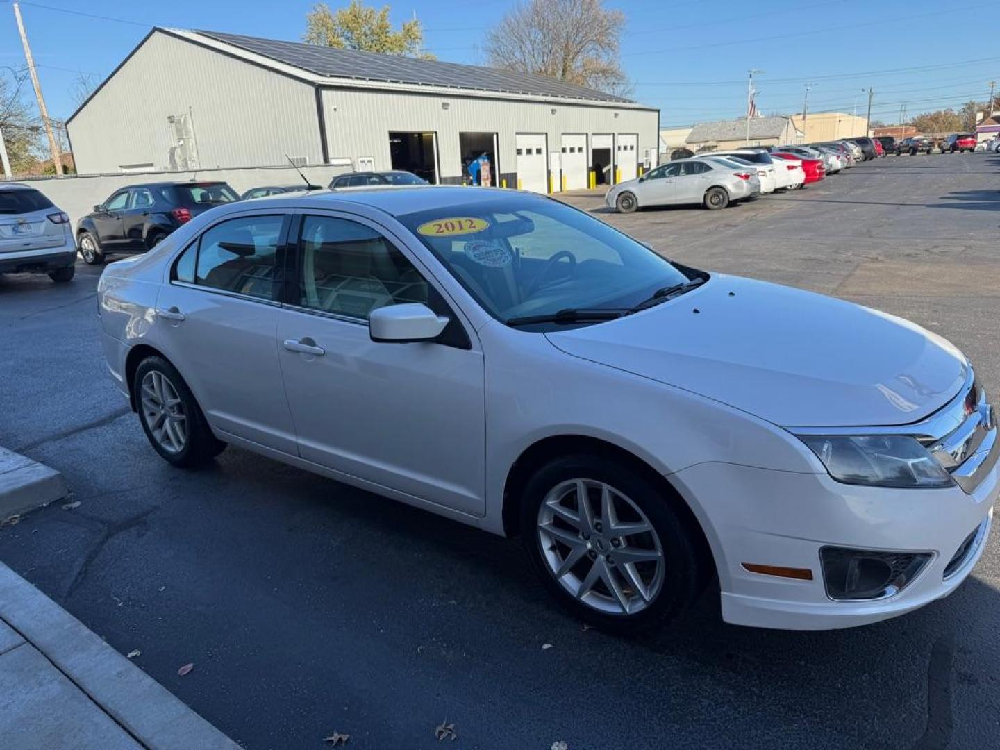 2012 WHITE FORD FUSION SEL (3FAHP0JA1CR) with an 2.5L engine, Automatic transmission, located at 3100 Covert Avenue, Evansville, IN, 47714, (812) 473-4492, 37.955418, -87.512238 - Photo#2