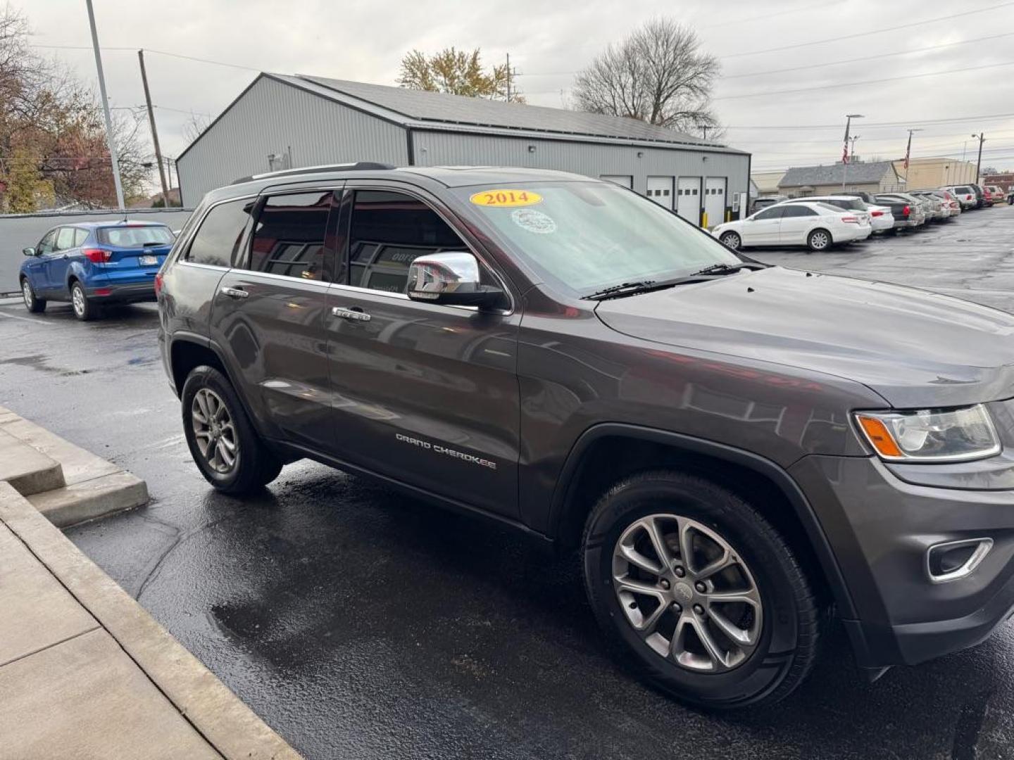 2014 GRAY JEEP GRAND CHEROKEE LIMITED (1C4RJFBG5EC) with an 3.6L engine, Automatic transmission, located at 3100 Covert Avenue, Evansville, IN, 47714, (812) 473-4492, 37.955418, -87.512238 - Photo#2