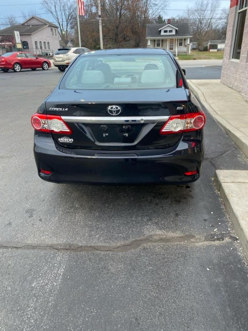 2012 BLACK TOYOTA COROLLA BASE (5YFBU4EE7CP) with an 1.8L engine, Automatic transmission, located at 3100 Covert Avenue, Evansville, IN, 47714, (812) 473-4492, 37.955418, -87.512238 - Photo#2