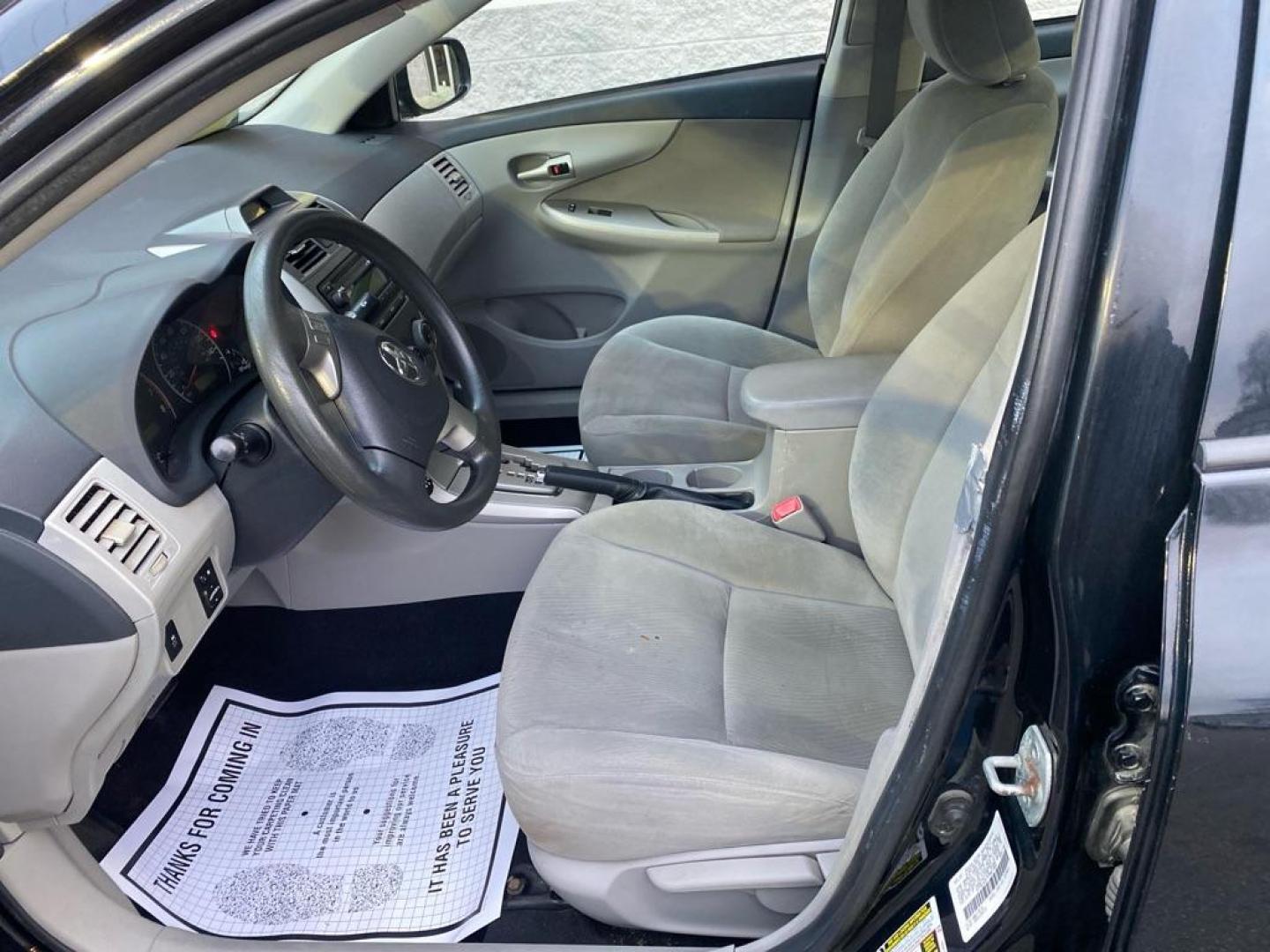 2012 BLACK TOYOTA COROLLA BASE (5YFBU4EE7CP) with an 1.8L engine, Automatic transmission, located at 3100 Covert Avenue, Evansville, IN, 47714, (812) 473-4492, 37.955418, -87.512238 - Photo#3