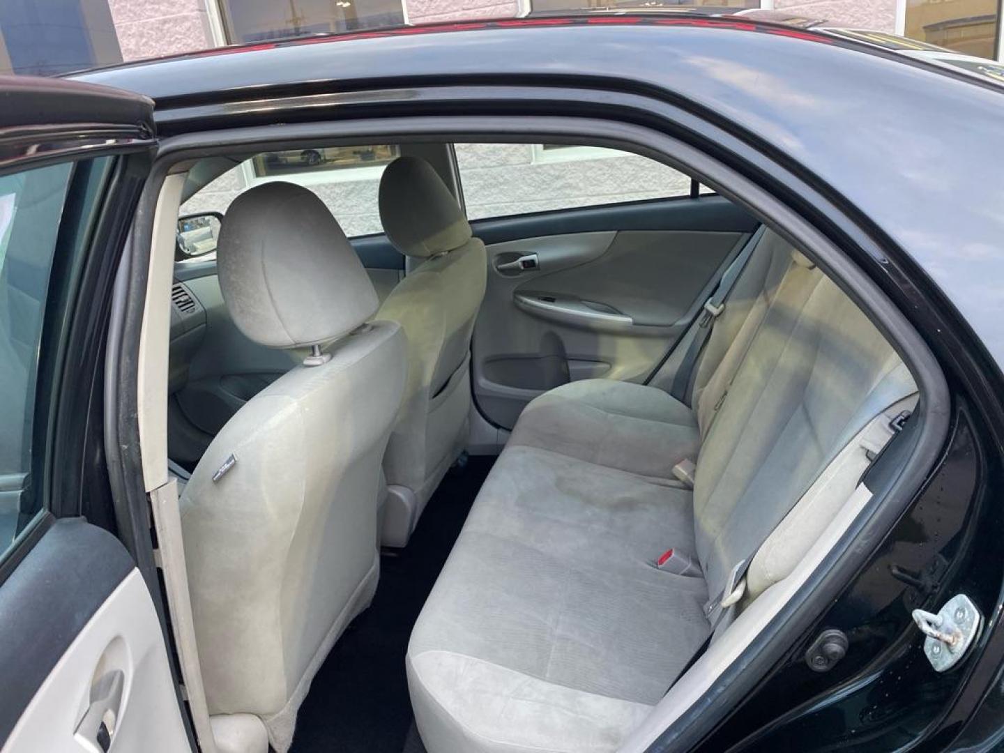 2012 BLACK TOYOTA COROLLA BASE (5YFBU4EE7CP) with an 1.8L engine, Automatic transmission, located at 3100 Covert Avenue, Evansville, IN, 47714, (812) 473-4492, 37.955418, -87.512238 - Photo#4