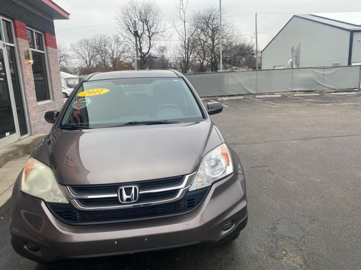 2011 BROWN HONDA CR-V LX (5J6RE3H33BL) with an 2.4L engine, Automatic transmission, located at 3100 Covert Avenue, Evansville, IN, 47714, (812) 473-4492, 37.955418, -87.512238 - Photo#1