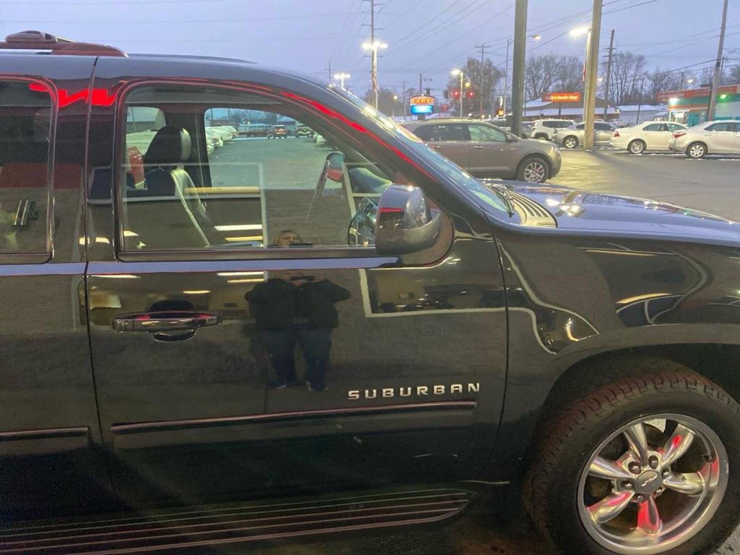 2012 BLACK CHEVROLET SUBURBAN 1500 LT (1GNSKJE79CR) with an 5.3L engine, Automatic transmission, located at 3100 Covert Avenue, Evansville, IN, 47714, (812) 473-4492, 37.955418, -87.512238 - Photo#2