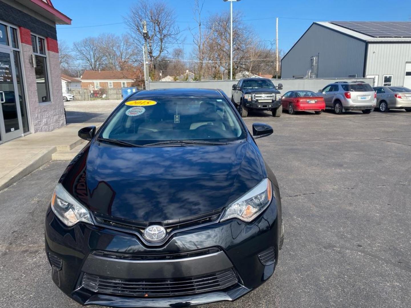 2015 BLACK TOYOTA COROLLA L (5YFBURHE6FP) with an 1.8L engine, Automatic transmission, located at 3100 Covert Avenue, Evansville, IN, 47714, (812) 473-4492, 37.955418, -87.512238 - Photo#1