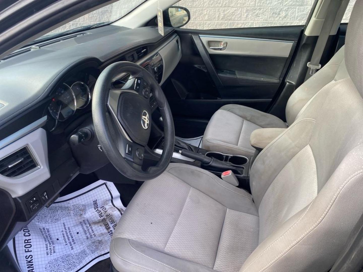 2015 BLACK TOYOTA COROLLA L (5YFBURHE6FP) with an 1.8L engine, Automatic transmission, located at 3100 Covert Avenue, Evansville, IN, 47714, (812) 473-4492, 37.955418, -87.512238 - Photo#4