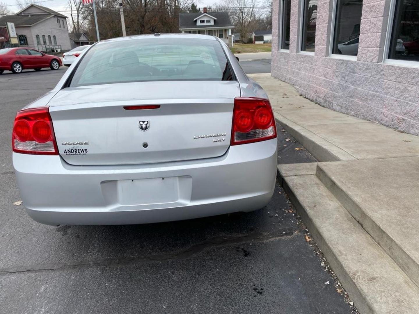 2009 SILVER DODGE CHARGER SXT (2B3KA33V69H) with an 3.5L engine, Automatic transmission, located at 3100 Covert Avenue, Evansville, IN, 47714, (812) 473-4492, 37.955418, -87.512238 - Photo#3