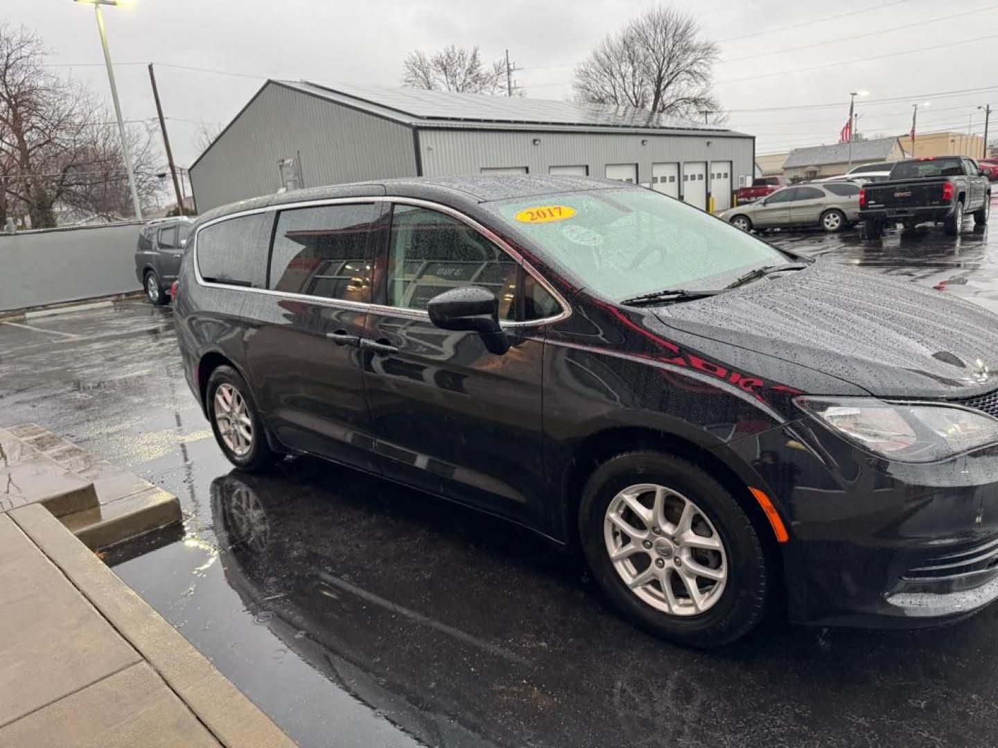 2017 BLACK CHRYSLER PACIFICA TOURING (2C4RC1DG6HR) with an 3.6L engine, Automatic transmission, located at 3100 Covert Avenue, Evansville, IN, 47714, (812) 473-4492, 37.955418, -87.512238 - Photo#2