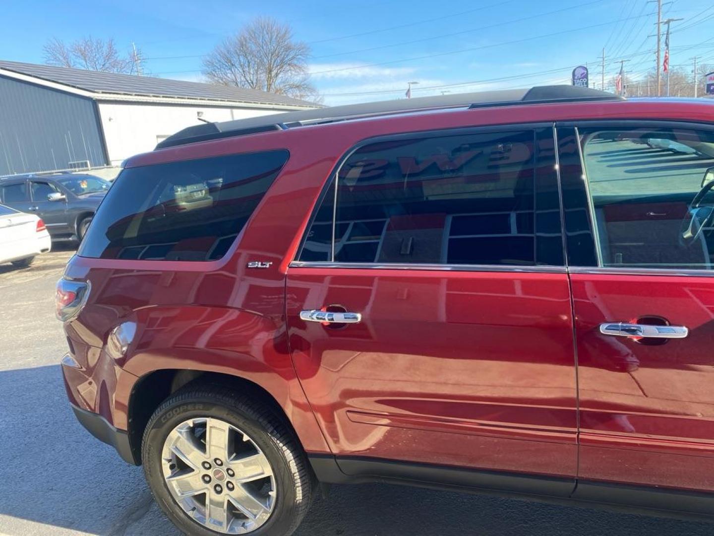 2017 MAROON GMC ACADIA LIMITED SLT-2 (1GKKRSKD1HJ) with an 3.6L engine, Automatic transmission, located at 3100 Covert Avenue, Evansville, IN, 47714, (812) 473-4492, 37.955418, -87.512238 - Photo#3