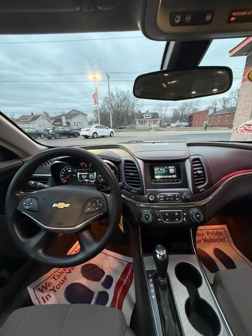 2017 WHITE CHEVROLET IMPALA LS (1G11Z5S38HU) with an 3.6L engine, Automatic transmission, located at 3100 Covert Avenue, Evansville, IN, 47714, (812) 473-4492, 37.955418, -87.512238 - Photo#4