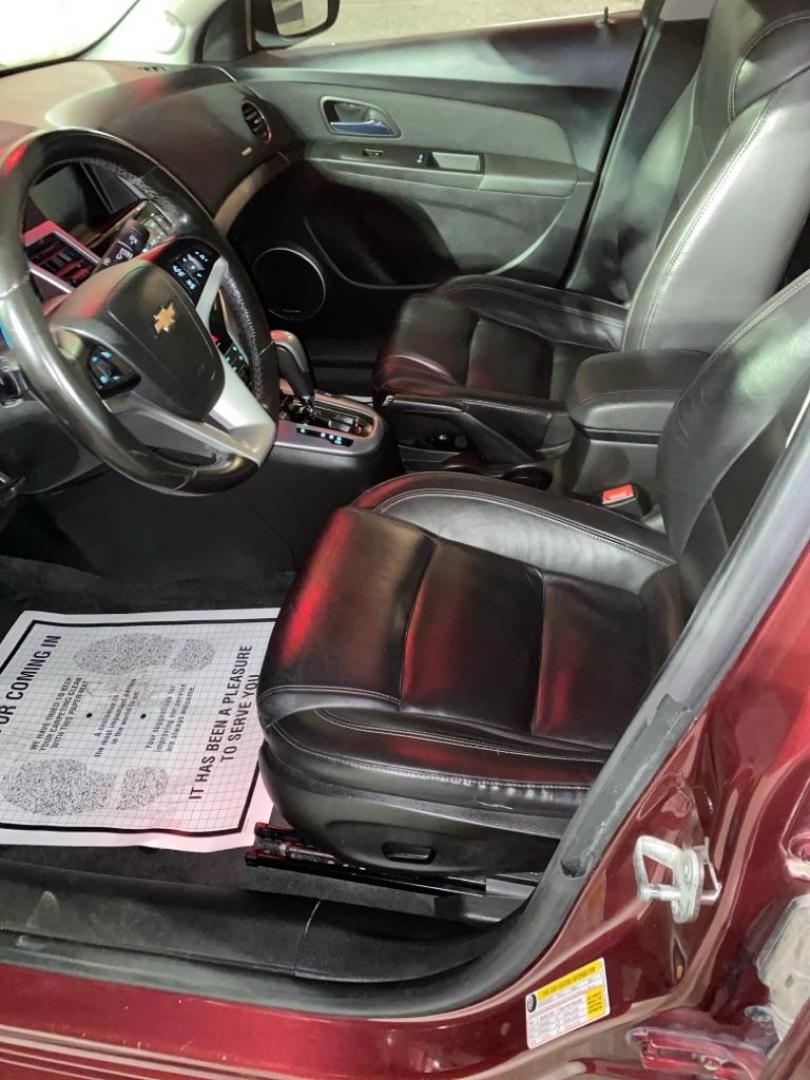 2015 RED CHEVROLET CRUZE LTZ (1G1PG5SB5F7) with an 1.4L engine, Automatic transmission, located at 3100 Covert Avenue, Evansville, IN, 47714, (812) 473-4492, 37.955418, -87.512238 - Photo#5