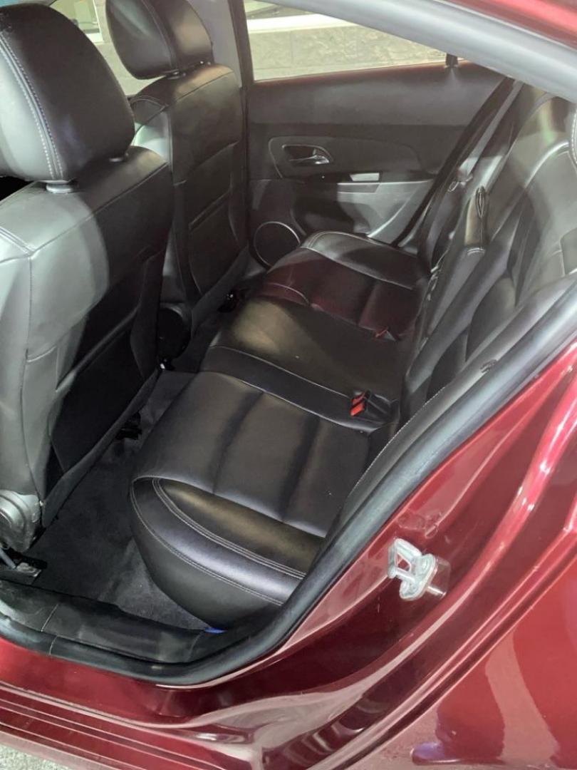 2015 RED CHEVROLET CRUZE LTZ (1G1PG5SB5F7) with an 1.4L engine, Automatic transmission, located at 3100 Covert Avenue, Evansville, IN, 47714, (812) 473-4492, 37.955418, -87.512238 - Photo#6