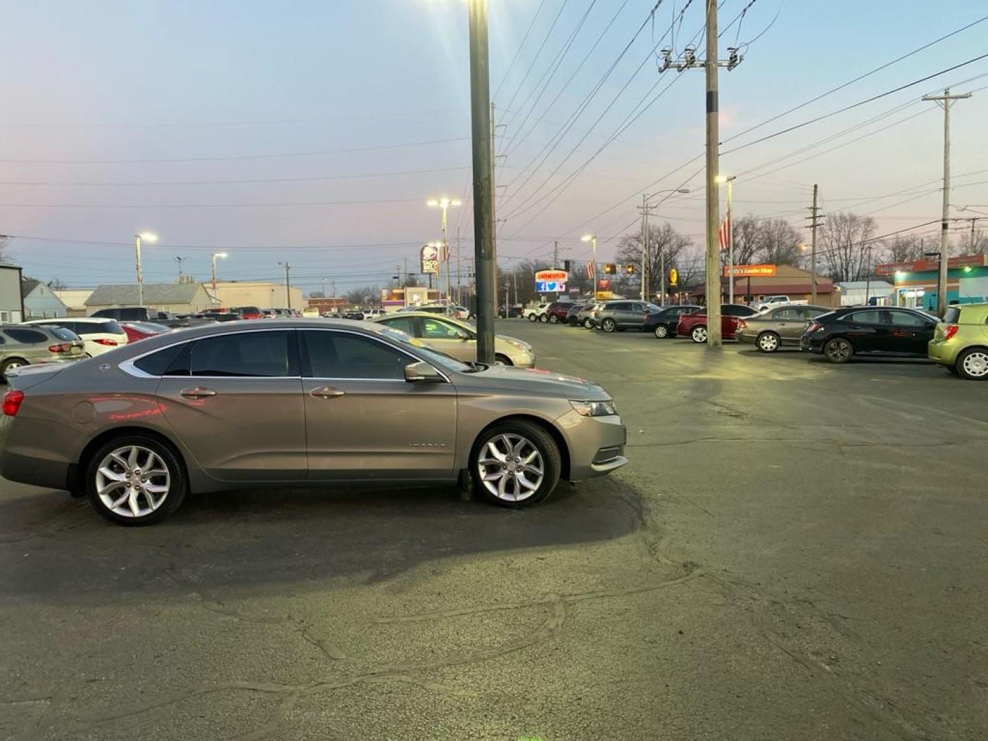 2017 SILVER CHEVROLET IMPALA LT (2G1105S32H9) with an 3.6L engine, Automatic transmission, located at 3100 Covert Avenue, Evansville, IN, 47714, (812) 473-4492, 37.955418, -87.512238 - Photo#2