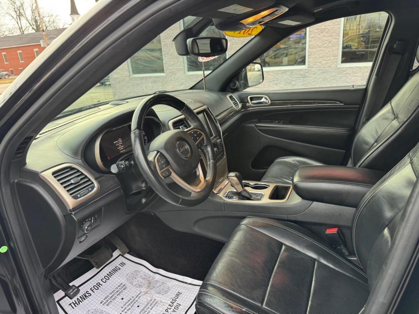 2017 BLACK JEEP GRAND CHEROKEE OVERLAND (1C4RJECGXHC) with an 3.6L engine, Automatic transmission, located at 3100 Covert Avenue, Evansville, IN, 47714, (812) 473-4492, 37.955418, -87.512238 - Photo#4