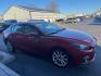 2016 RED MAZDA 3 GRAND TOURING (JM1BM1X35G1) with an 2.5L engine, Automatic transmission, located at 3100 Covert Avenue, Evansville, IN, 47714, (812) 473-4492, 37.955418, -87.512238 - Photo#2