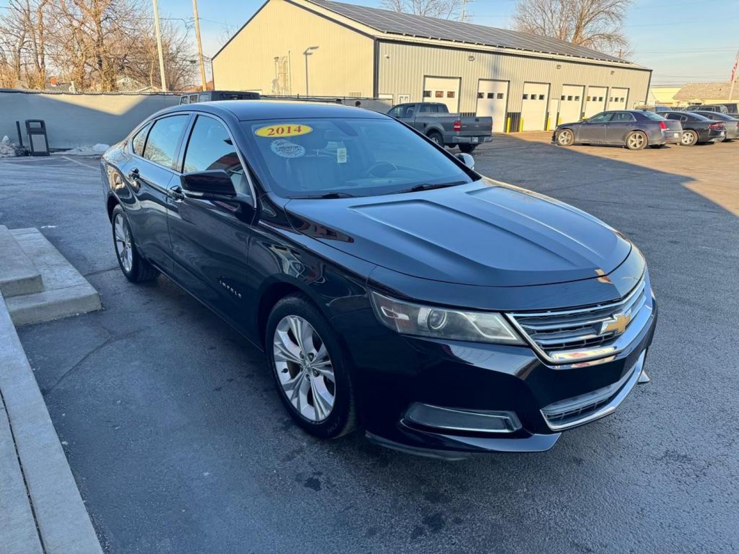 2014 BLACK CHEVROLET IMPALA LT (2G1125S38E9) with an 3.6L engine, Automatic transmission, located at 3100 Covert Avenue, Evansville, IN, 47714, (812) 473-4492, 37.955418, -87.512238 - Photo#2