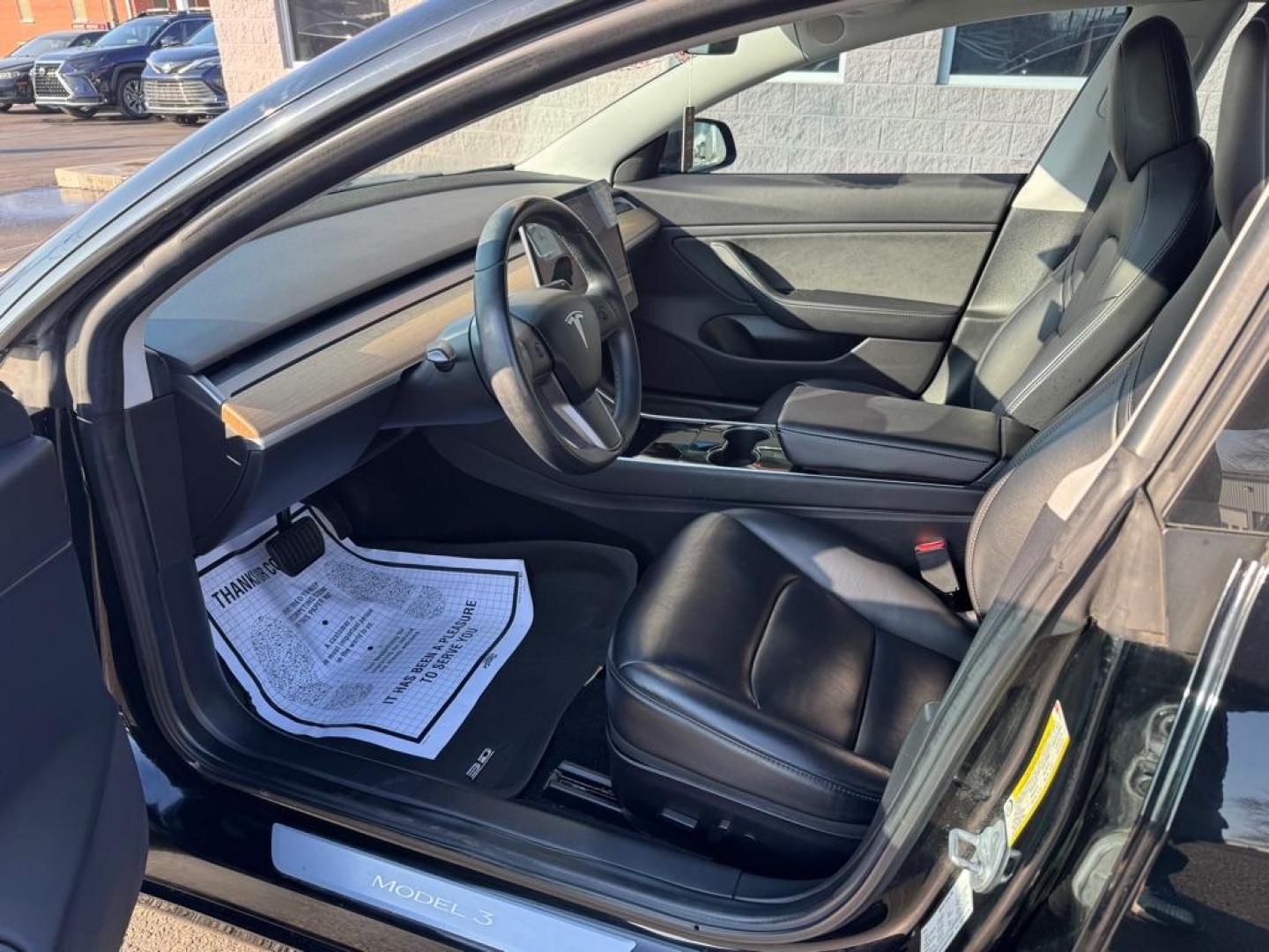 2019 BLACK TESLA MODEL 3 (5YJ3E1EB5KF) , Continuously Variable transmission, located at 3100 Covert Avenue, Evansville, IN, 47714, (812) 473-4492, 37.955418, -87.512238 - **1 Owner!** **Battery Replaced by Tesla in January 2024** - Photo#4