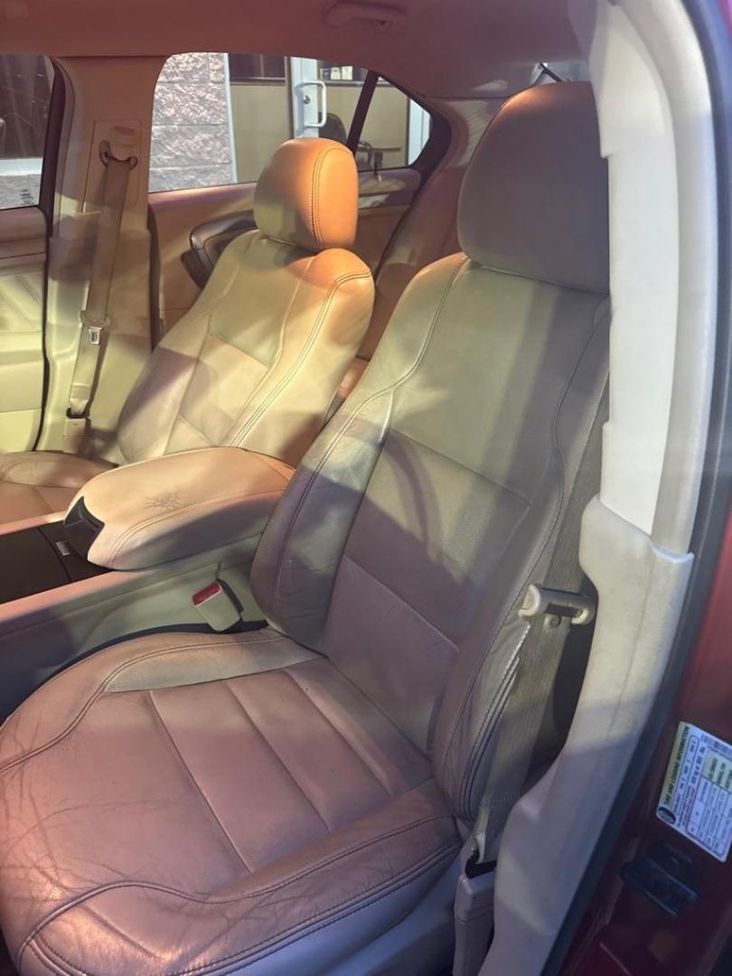 2014 RED FORD TAURUS SEL (1FAHP2E85EG) with an 3.5L engine, Automatic transmission, located at 3100 Covert Avenue, Evansville, IN, 47714, (812) 473-4492, 37.955418, -87.512238 - Photo#5