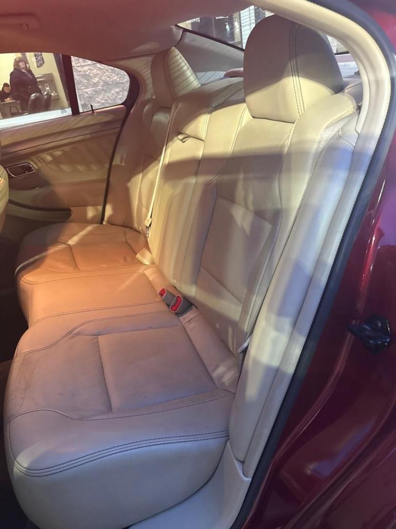 2014 RED FORD TAURUS SEL (1FAHP2E85EG) with an 3.5L engine, Automatic transmission, located at 3100 Covert Avenue, Evansville, IN, 47714, (812) 473-4492, 37.955418, -87.512238 - Photo#6