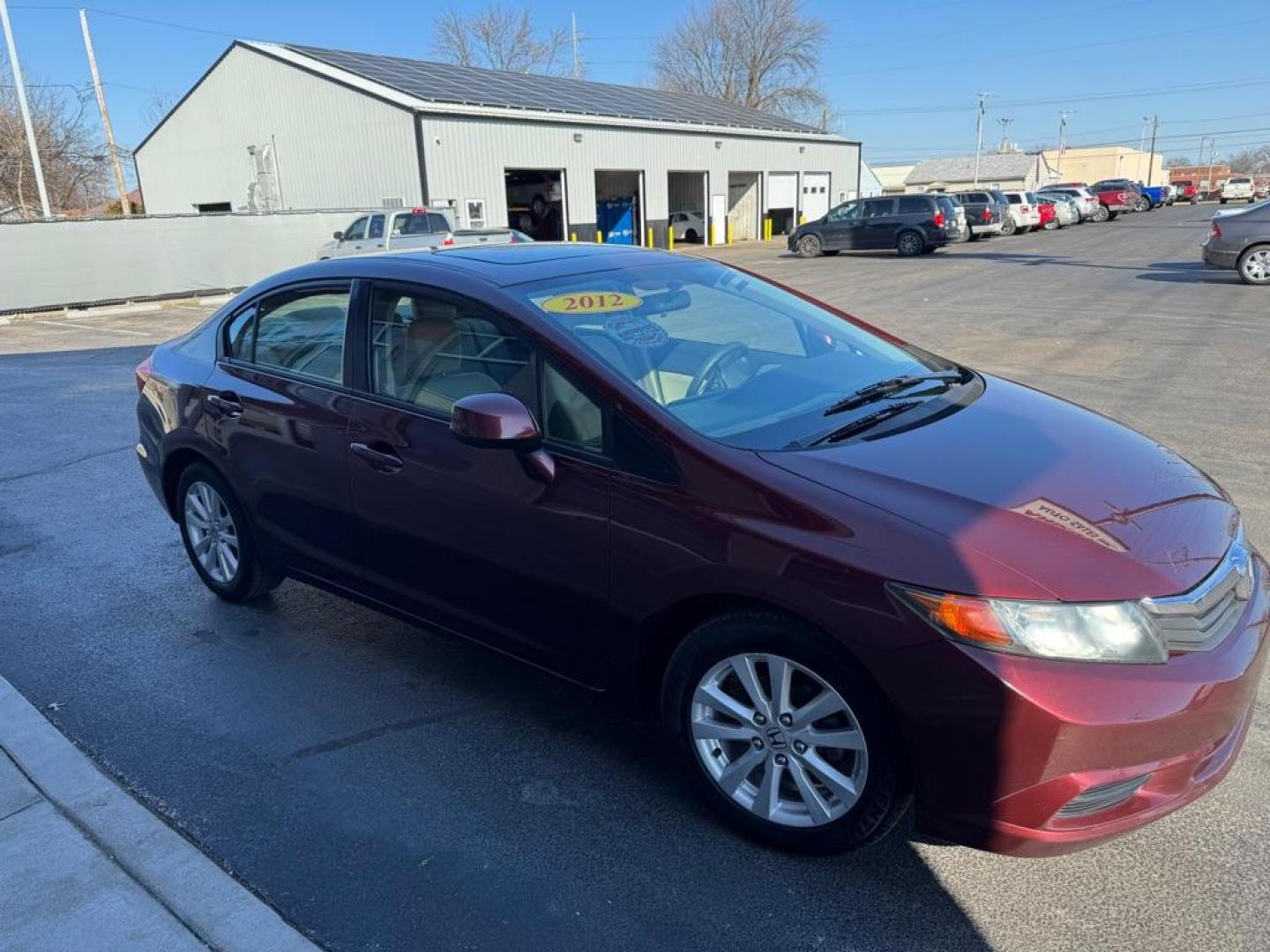 2012 RED HONDA CIVIC EX (19XFB2F84CE) with an 1.8L engine, Automatic transmission, located at 3100 Covert Avenue, Evansville, IN, 47714, (812) 473-4492, 37.955418, -87.512238 - Photo#2