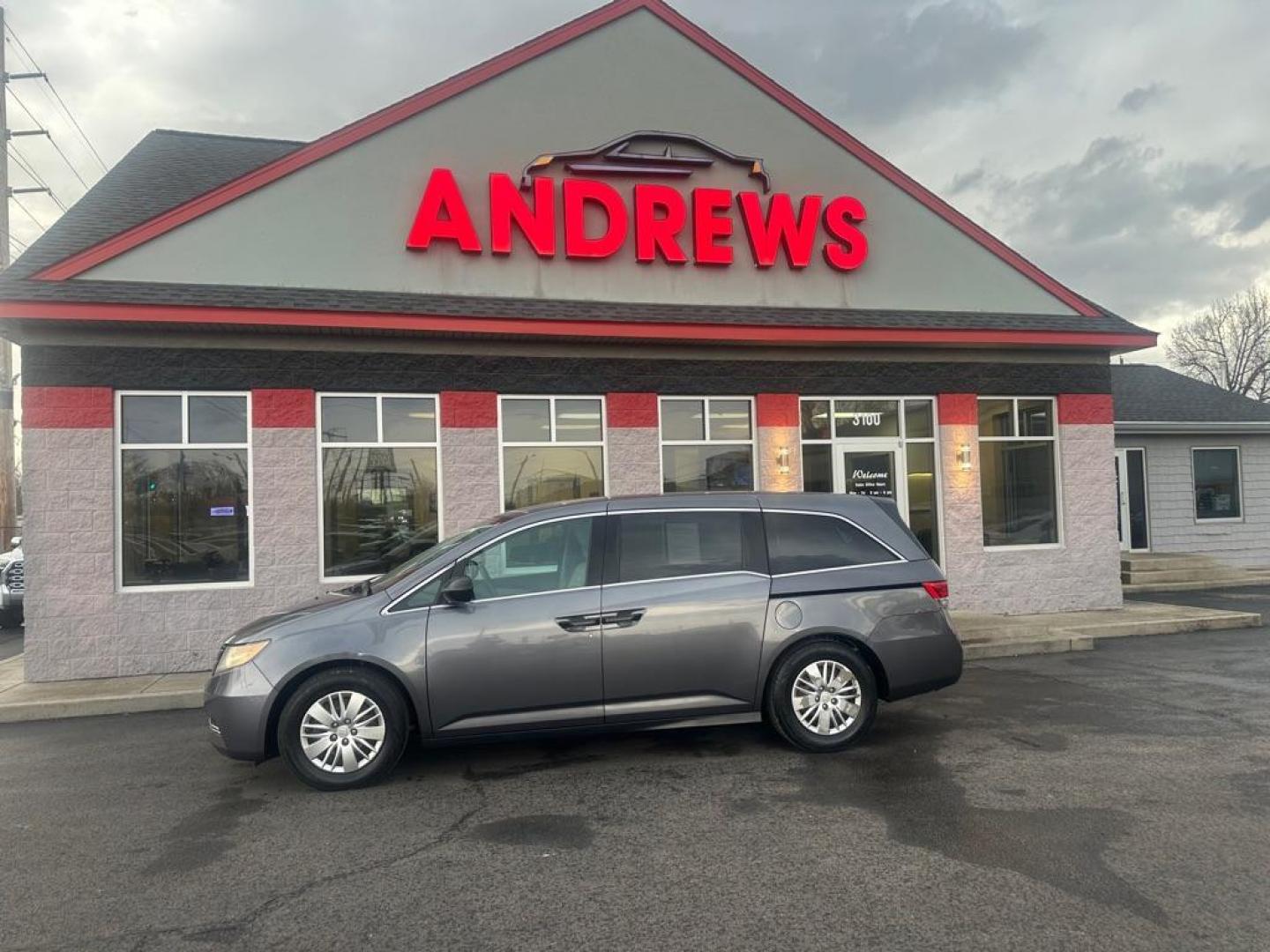 2015 GRAY HONDA ODYSSEY LX (5FNRL5H22FB) with an 3.5L engine, Automatic transmission, located at 3100 Covert Avenue, Evansville, IN, 47714, (812) 473-4492, 37.955418, -87.512238 - Photo#0