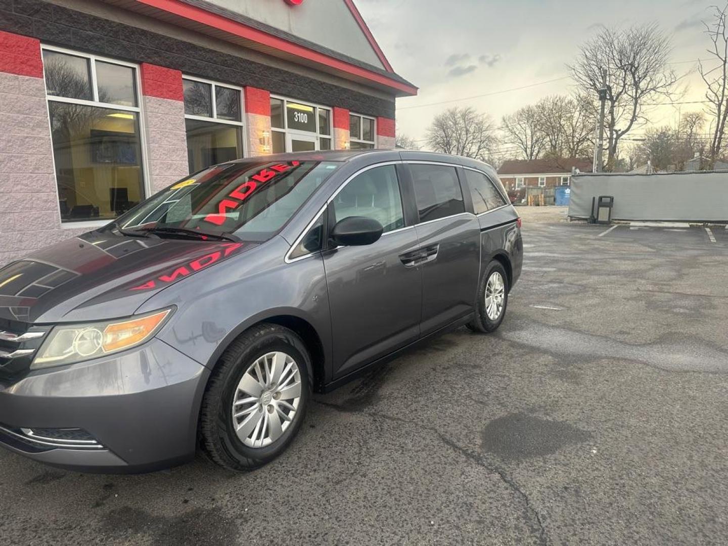 2015 GRAY HONDA ODYSSEY LX (5FNRL5H22FB) with an 3.5L engine, Automatic transmission, located at 3100 Covert Avenue, Evansville, IN, 47714, (812) 473-4492, 37.955418, -87.512238 - Photo#2