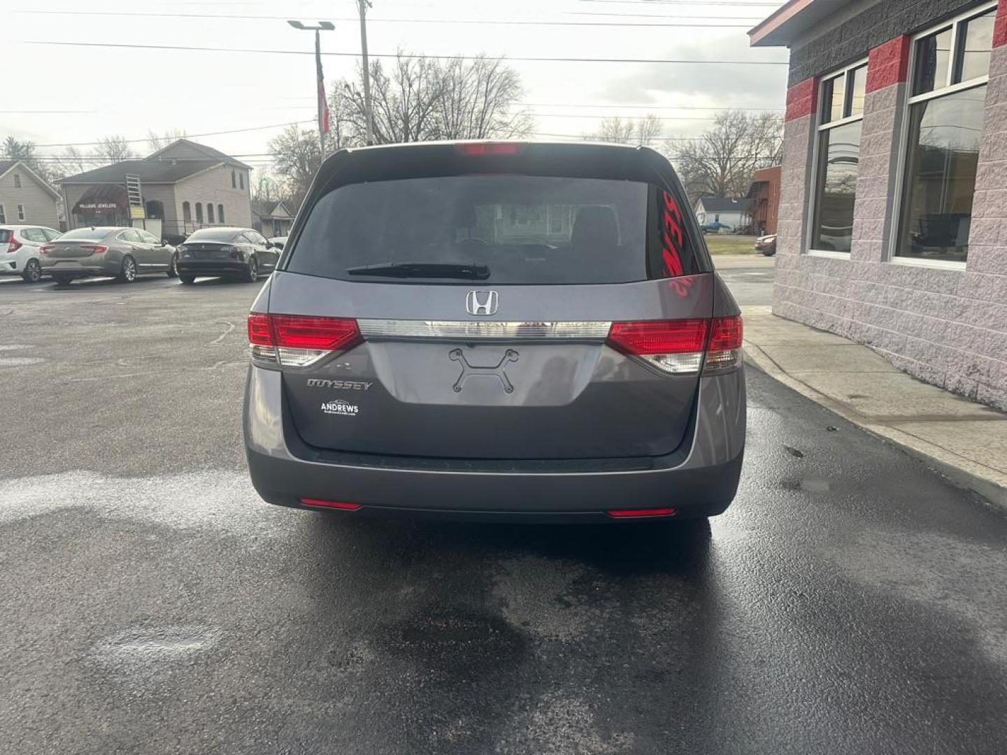 2015 GRAY HONDA ODYSSEY LX (5FNRL5H22FB) with an 3.5L engine, Automatic transmission, located at 3100 Covert Avenue, Evansville, IN, 47714, (812) 473-4492, 37.955418, -87.512238 - Photo#4