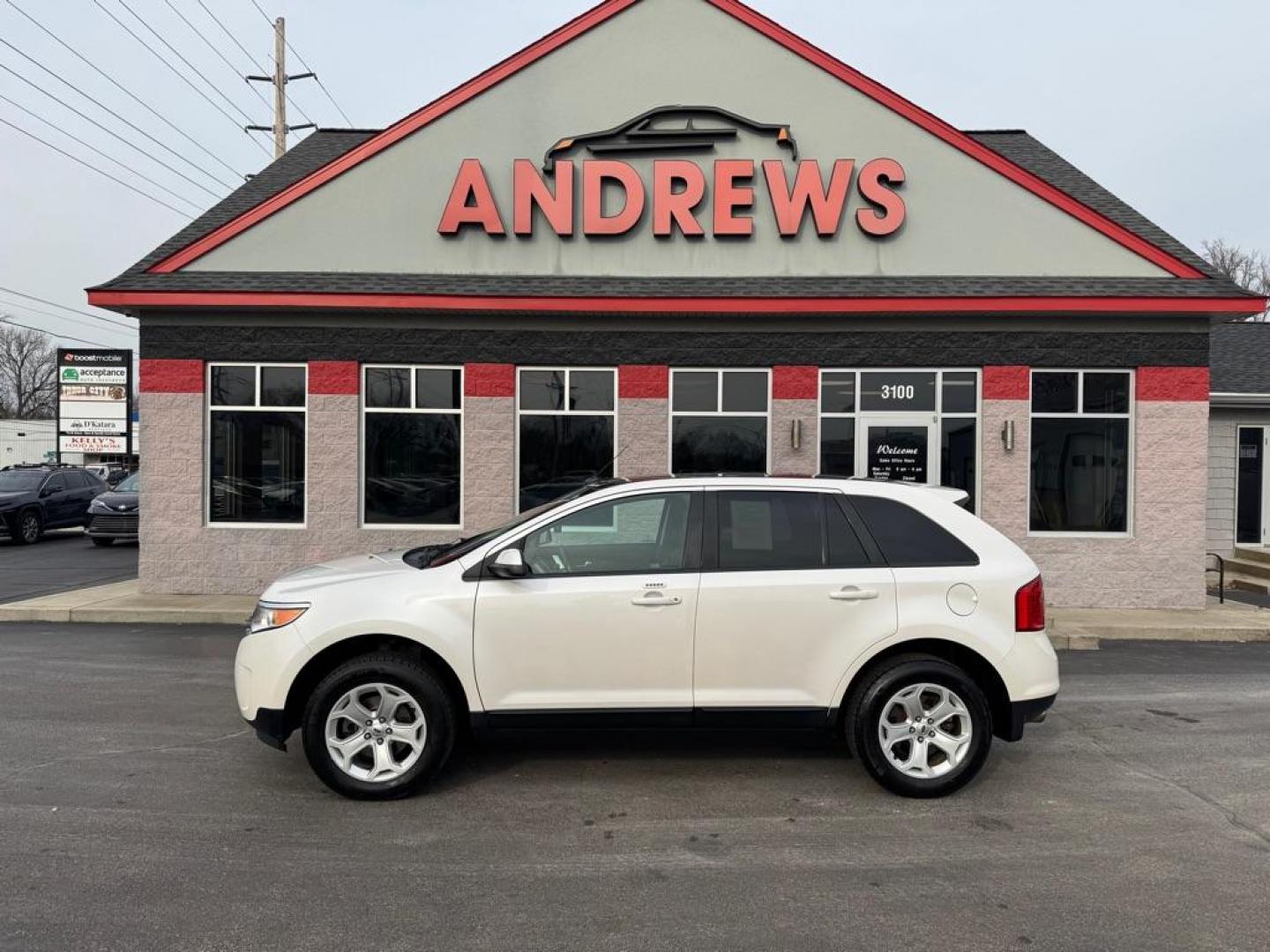 2013 WHITE FORD EDGE SEL (2FMDK4JC8DB) with an 3.5L engine, Automatic transmission, located at 3100 Covert Avenue, Evansville, IN, 47714, (812) 473-4492, 37.955418, -87.512238 - Photo#0