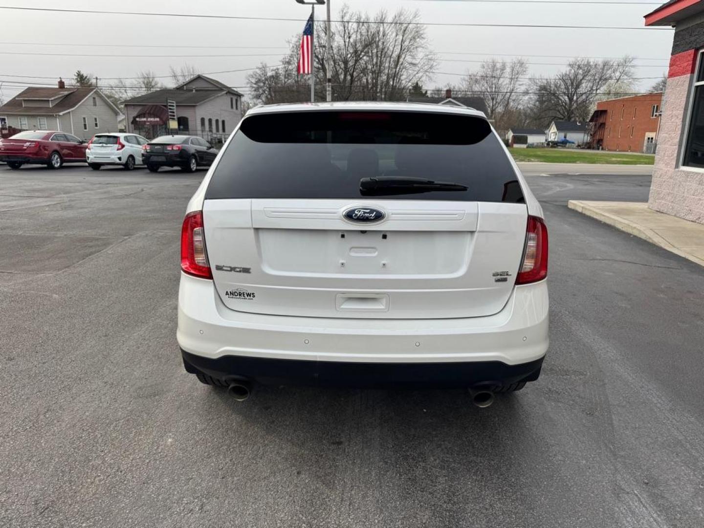 2013 WHITE FORD EDGE SEL (2FMDK4JC8DB) with an 3.5L engine, Automatic transmission, located at 3100 Covert Avenue, Evansville, IN, 47714, (812) 473-4492, 37.955418, -87.512238 - Photo#3