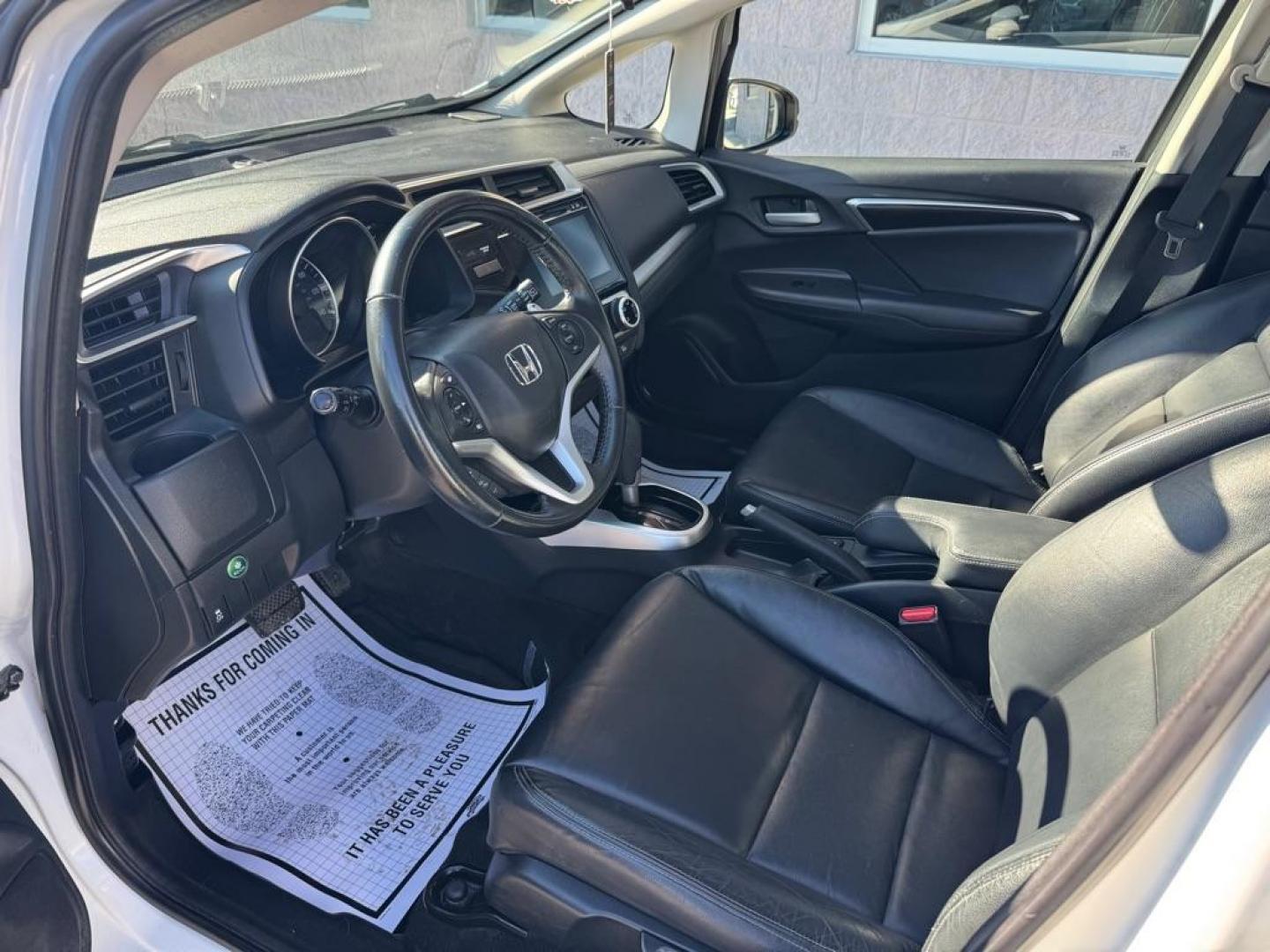 2015 WHITE HONDA FIT EX (3HGGK5H82FM) with an 1.5L engine, Continuously Variable transmission, located at 3100 Covert Avenue, Evansville, IN, 47714, (812) 473-4492, 37.955418, -87.512238 - Photo#4