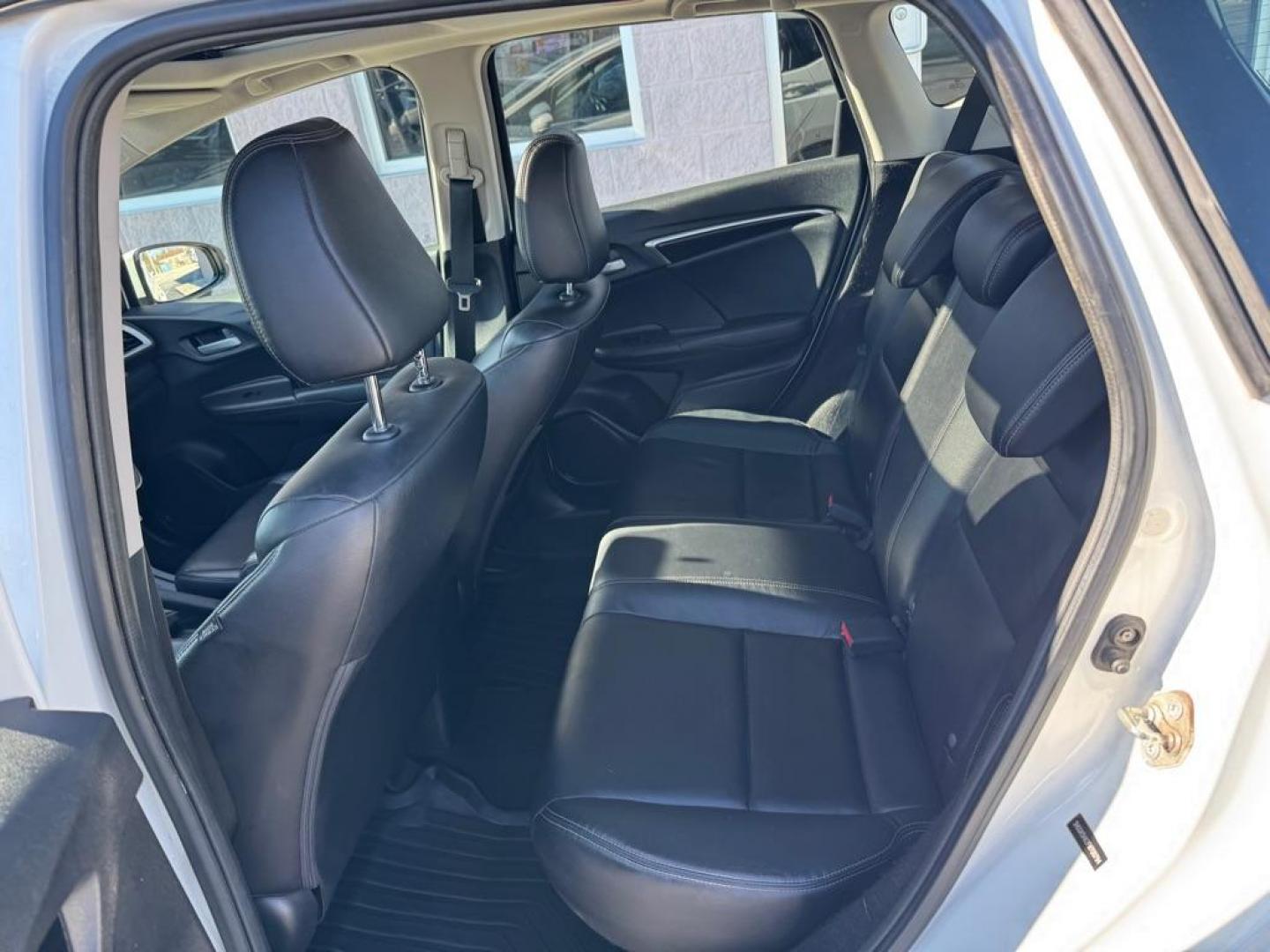 2015 WHITE HONDA FIT EX (3HGGK5H82FM) with an 1.5L engine, Continuously Variable transmission, located at 3100 Covert Avenue, Evansville, IN, 47714, (812) 473-4492, 37.955418, -87.512238 - Photo#5