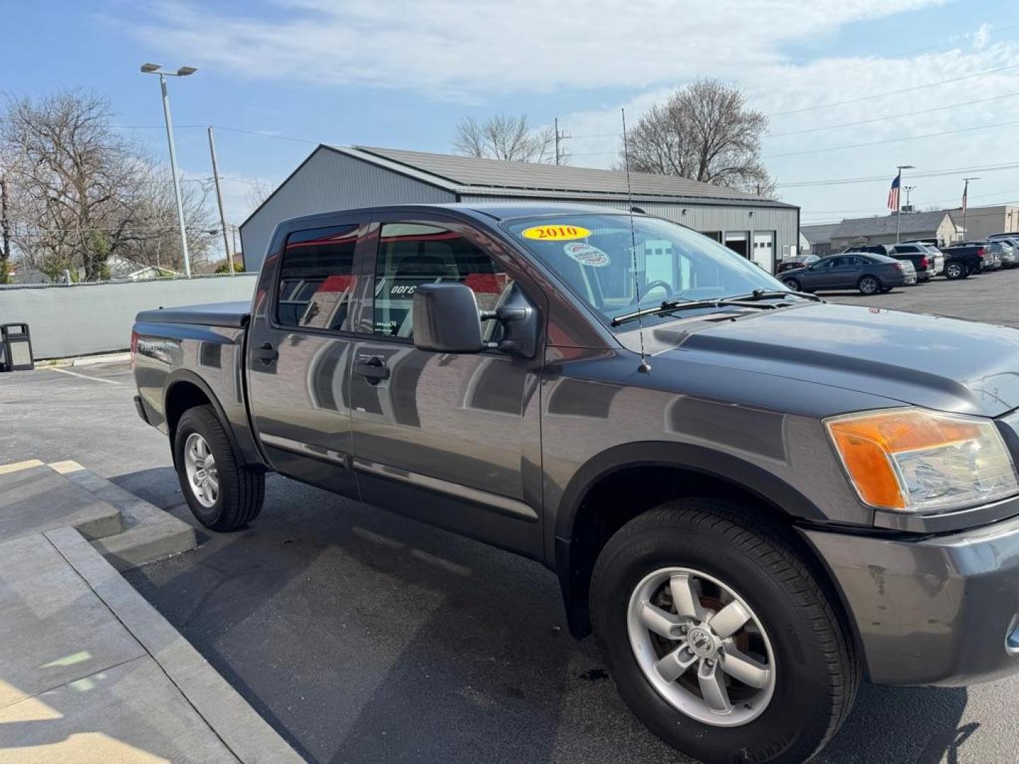 2010 GRAY NISSAN TITAN XE (1N6BA0EC6AN) with an 5.6L engine, Automatic transmission, located at 3100 Covert Avenue, Evansville, IN, 47714, (812) 473-4492, 37.955418, -87.512238 - Photo#2