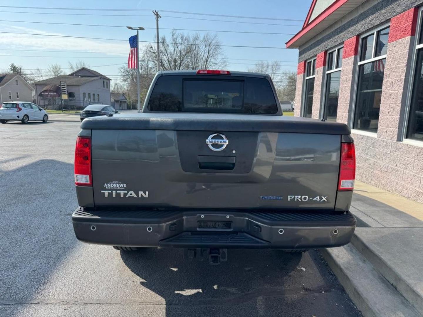 2010 GRAY NISSAN TITAN XE (1N6BA0EC6AN) with an 5.6L engine, Automatic transmission, located at 3100 Covert Avenue, Evansville, IN, 47714, (812) 473-4492, 37.955418, -87.512238 - Photo#3