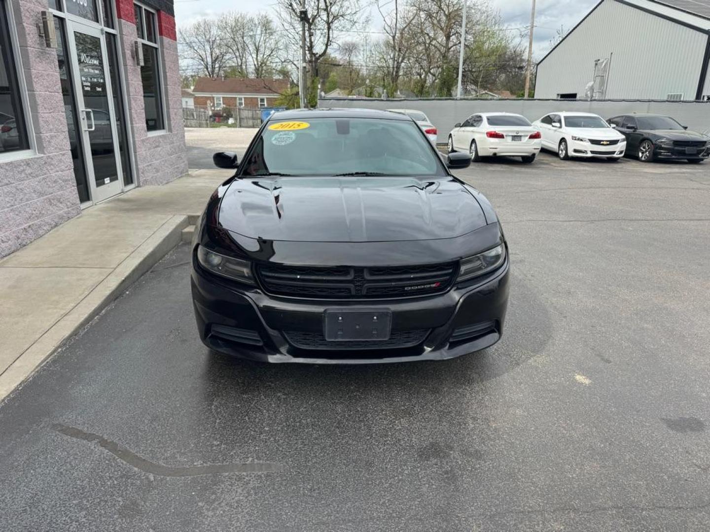 2015 BLACK DODGE CHARGER SE (2C3CDXBGXFH) with an 3.6L engine, Automatic transmission, located at 3100 Covert Avenue, Evansville, IN, 47714, (812) 473-4492, 37.955418, -87.512238 - Photo#1