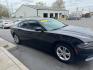 2015 BLACK DODGE CHARGER SE (2C3CDXBGXFH) with an 3.6L engine, Automatic transmission, located at 3100 Covert Avenue, Evansville, IN, 47714, (812) 473-4492, 37.955418, -87.512238 - Photo#2
