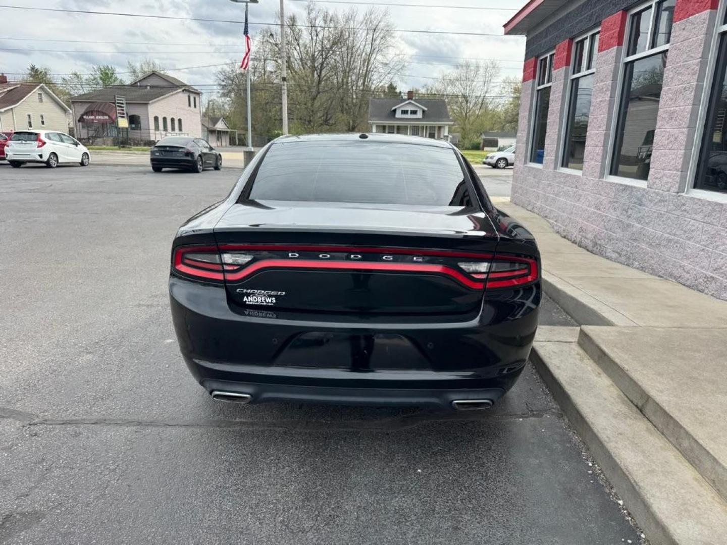 2015 BLACK DODGE CHARGER SE (2C3CDXBGXFH) with an 3.6L engine, Automatic transmission, located at 3100 Covert Avenue, Evansville, IN, 47714, (812) 473-4492, 37.955418, -87.512238 - Photo#3