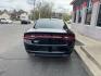 2015 BLACK DODGE CHARGER SE (2C3CDXBGXFH) with an 3.6L engine, Automatic transmission, located at 3100 Covert Avenue, Evansville, IN, 47714, (812) 473-4492, 37.955418, -87.512238 - Photo#3