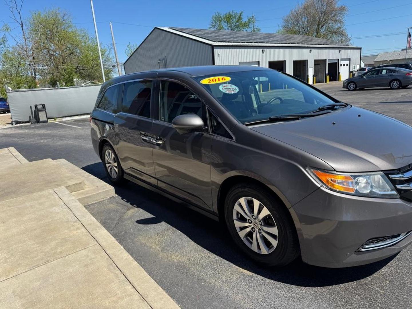 2016 GRAY HONDA ODYSSEY EX (5FNRL5H46GB) with an 3.5L engine, Automatic transmission, located at 3100 Covert Avenue, Evansville, IN, 47714, (812) 473-4492, 37.955418, -87.512238 - Photo#2