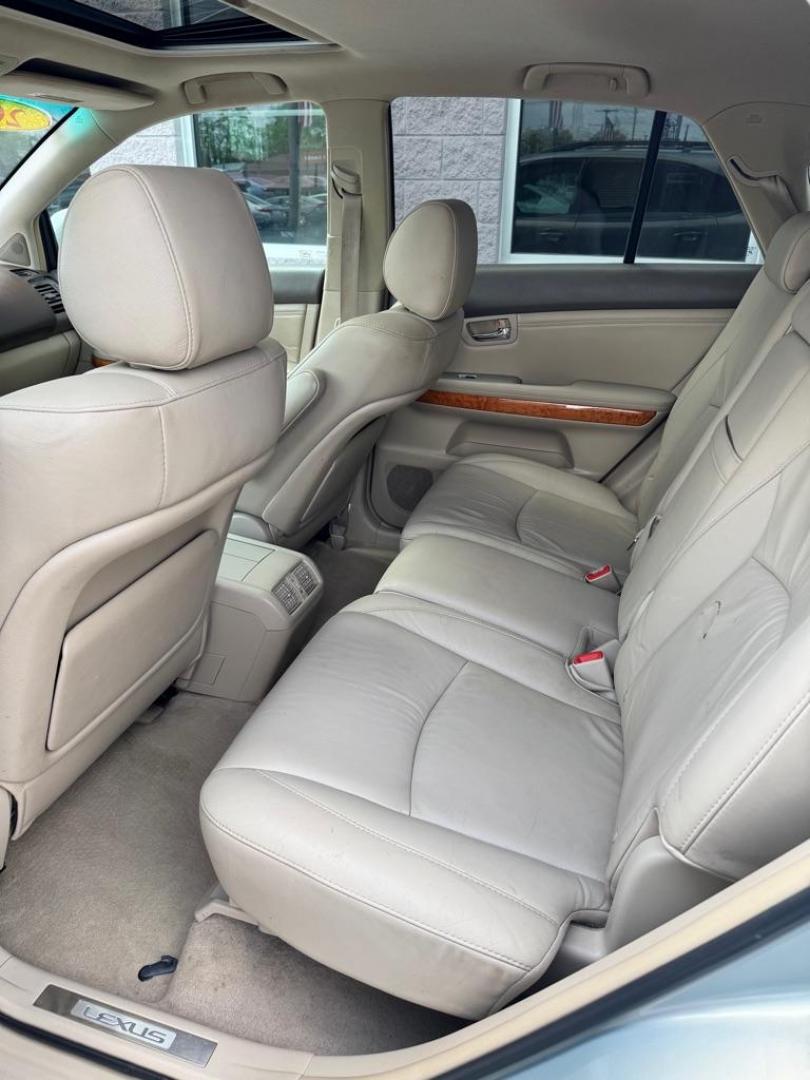 2008 GREEN LEXUS RX350 (2T2GK31U58C) with an 3.5L engine, Automatic transmission, located at 3100 Covert Avenue, Evansville, IN, 47714, (812) 473-4492, 37.955418, -87.512238 - Photo#4