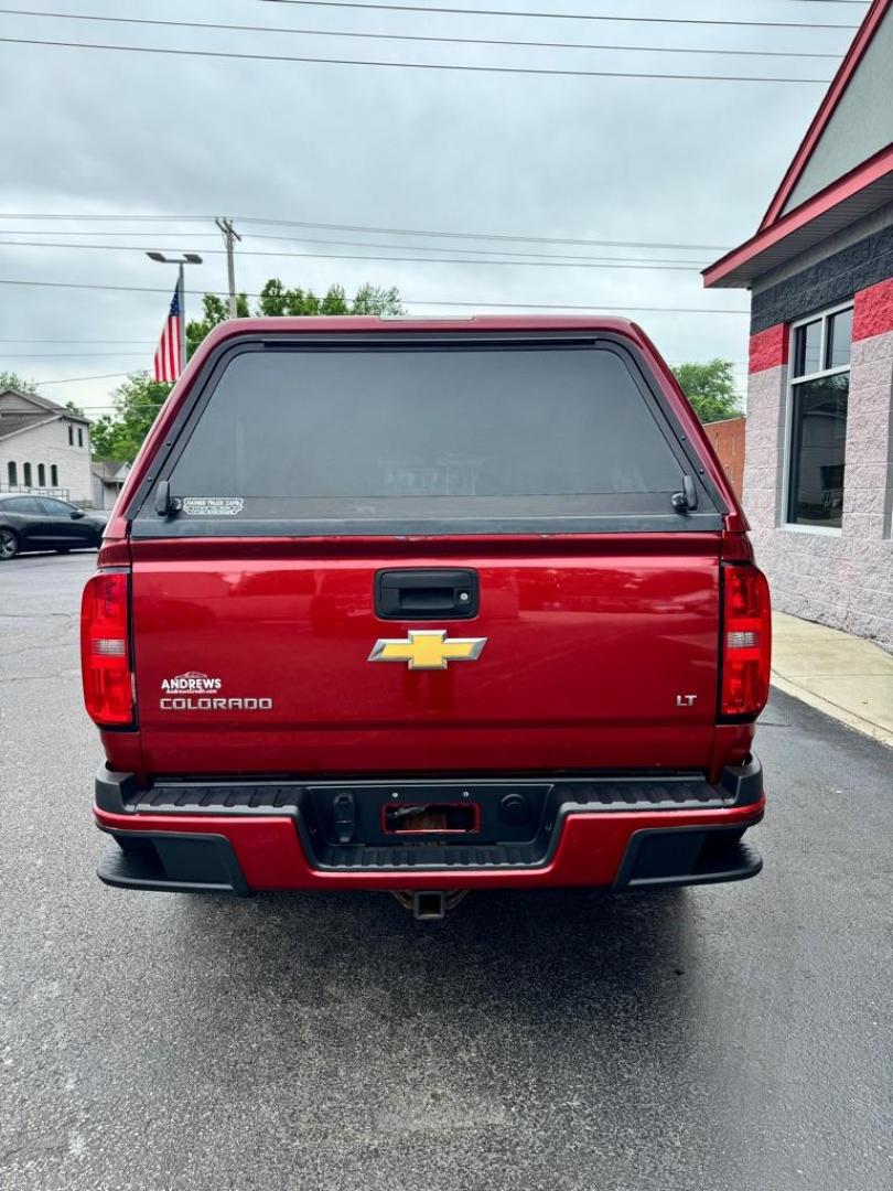 2015 RED CHEVROLET COLORADO LT (1GCGTBE30F1) with an 3.6L engine, Automatic transmission, located at 3100 Covert Avenue, Evansville, IN, 47714, (812) 473-4492, 37.955418, -87.512238 - Photo#6