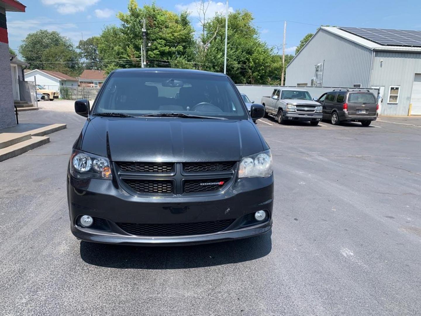 2014 BLACK DODGE GRAND CARAVAN SXT (2C4RDGCG7ER) with an 3.6L engine, Automatic transmission, located at 3100 Covert Avenue, Evansville, IN, 47714, (812) 473-4492, 37.955418, -87.512238 - Photo#1