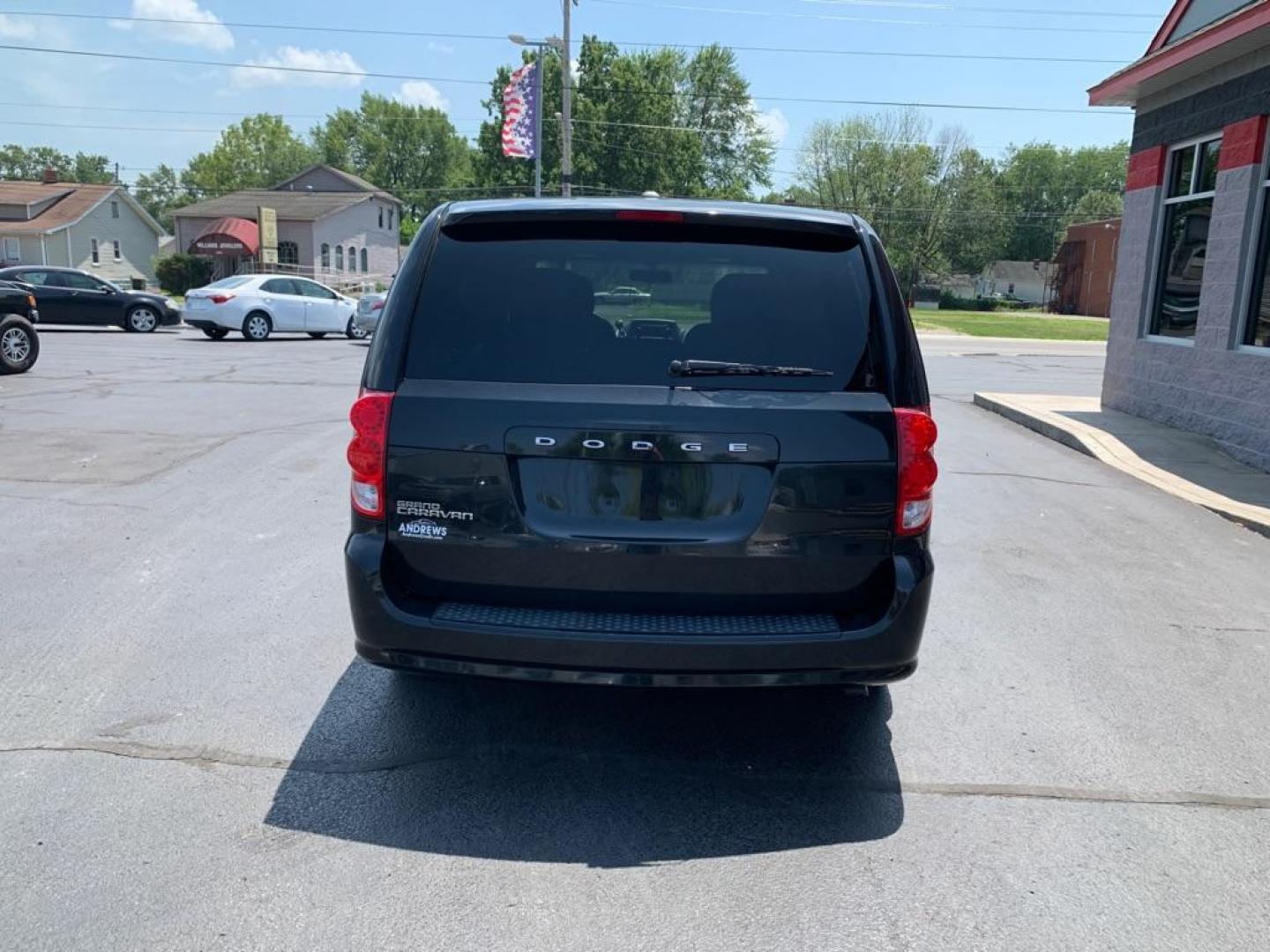 2014 BLACK DODGE GRAND CARAVAN SXT (2C4RDGCG7ER) with an 3.6L engine, Automatic transmission, located at 3100 Covert Avenue, Evansville, IN, 47714, (812) 473-4492, 37.955418, -87.512238 - Photo#3