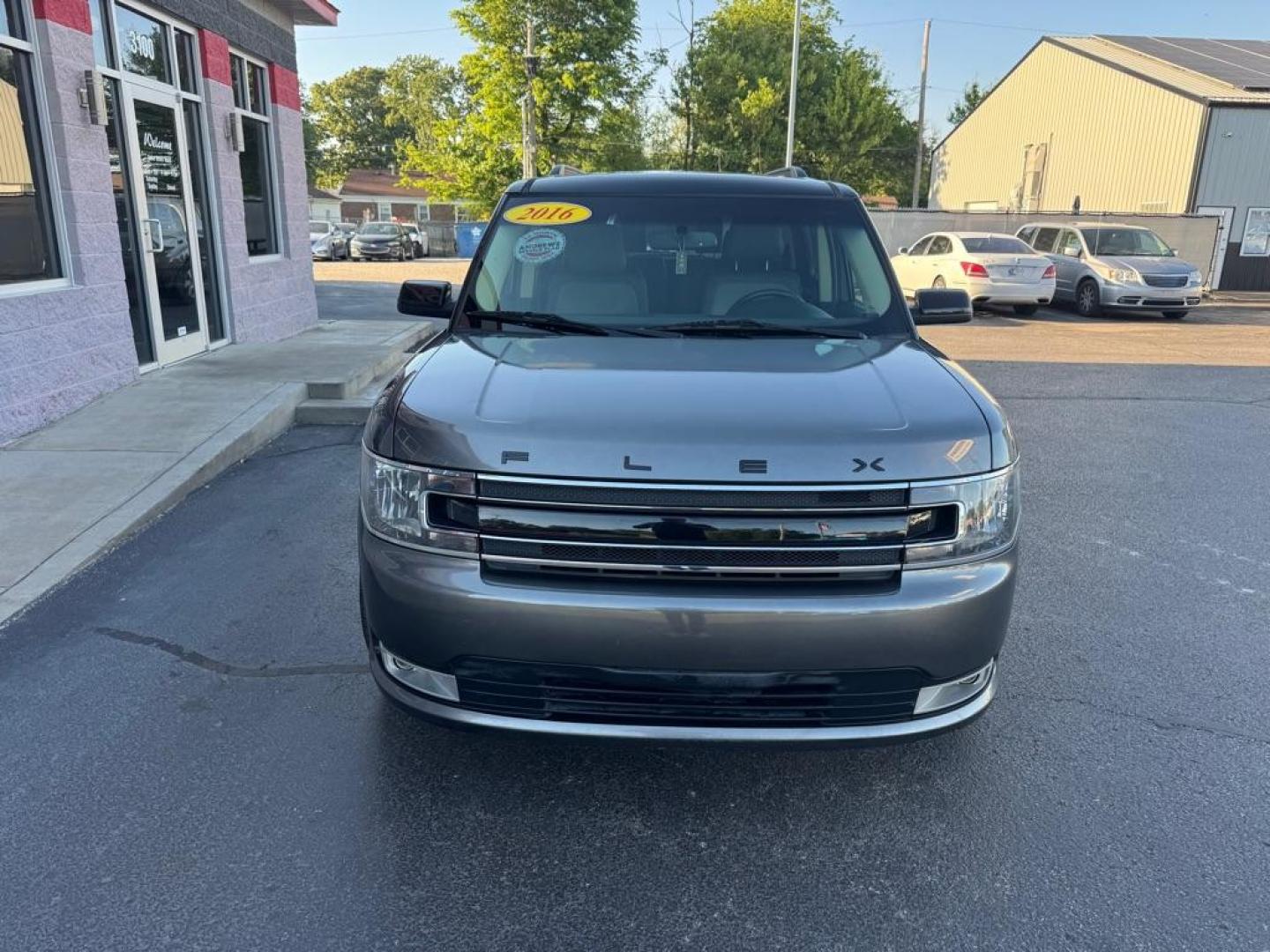 2016 GRAY FORD FLEX SEL (2FMGK5C80GB) with an 3.5L engine, Automatic transmission, located at 3100 Covert Avenue, Evansville, IN, 47714, (812) 473-4492, 37.955418, -87.512238 - Photo#1